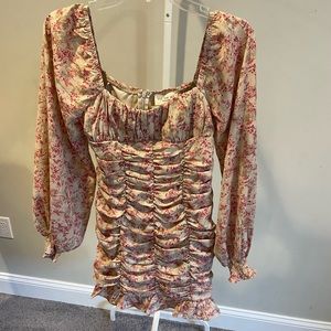 Urban Outfitters “Kiss the Sky” brand dress. Never worn. New with tag.